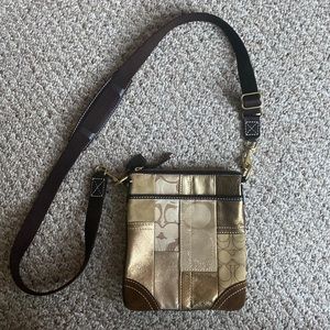 Gold Coach crossbody purse